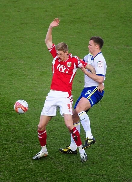 Bristol City vs. Cardiff City: Jon Stead vs. Mark Hudson Battle for Possession at Ashton Gate Stadium, 2012