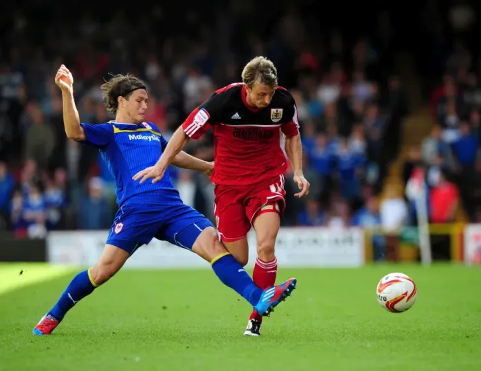 Framed Print : Bristol City vs. Cardiff City: Martyn Woolford Foul by Etien Velikonja Framed Print : Bristol City vs. Cardiff City: Martyn Woolford Foul by Etien Velikonja