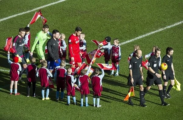 Bristol City vs. Cardiff City: Players and Mascots Take the Field at Ashton Gate