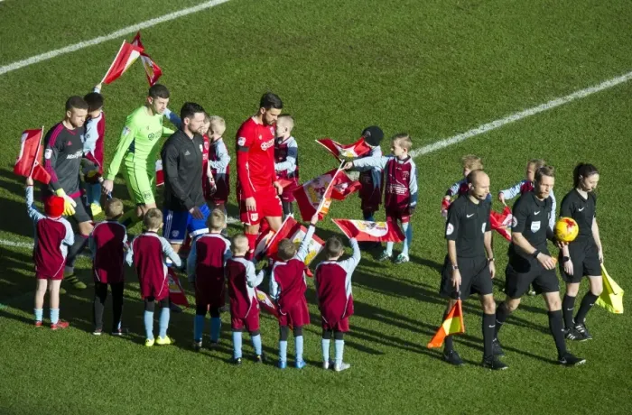 Framed Print : Bristol City vs. Cardiff City: Players and Mascots Take the Field at Ashton Gate Framed Print : Bristol City vs. Cardiff City: Players and Mascots Take the Field at Ashton Gate