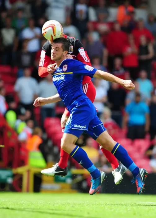Framed Print : Bristol City vs. Cardiff City: Ryan Taylor Seizes the Ball Over Andrew Taylor
