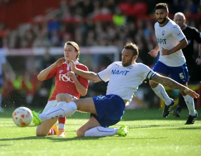 Framed Print : Bristol City vs Chesterfield: Luke Freeman Tackled by Ian Evatt