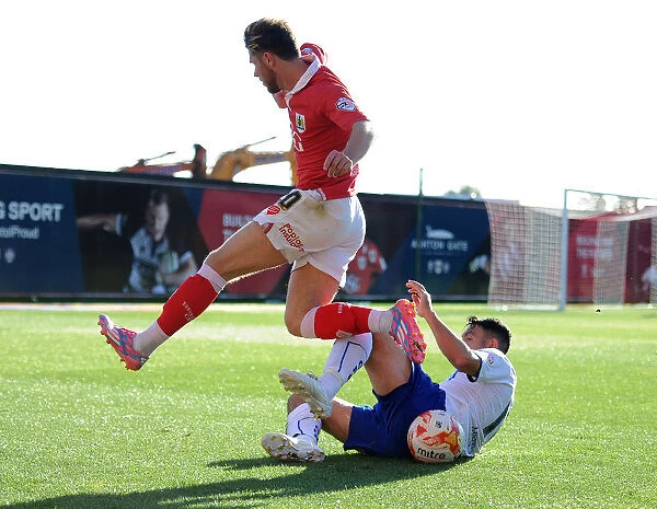 Bristol City vs Chesterfield: Wes Burns Tackled by Gary Roberts