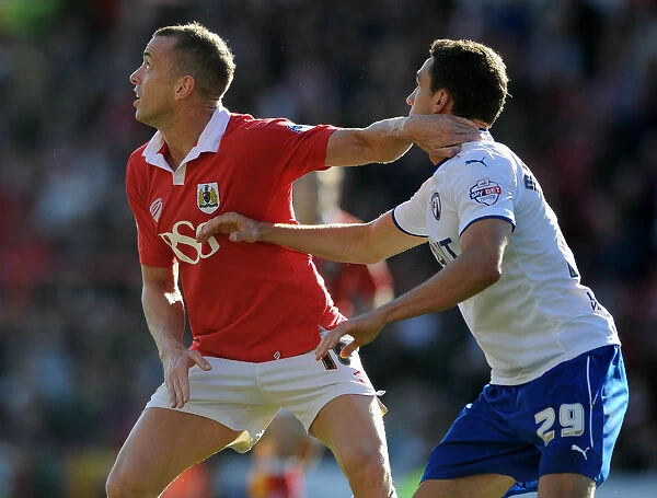 Bristol City vs Chesterfield: Wilbraham and Margreitter Battle for Ball in Sky Bet League One Clash