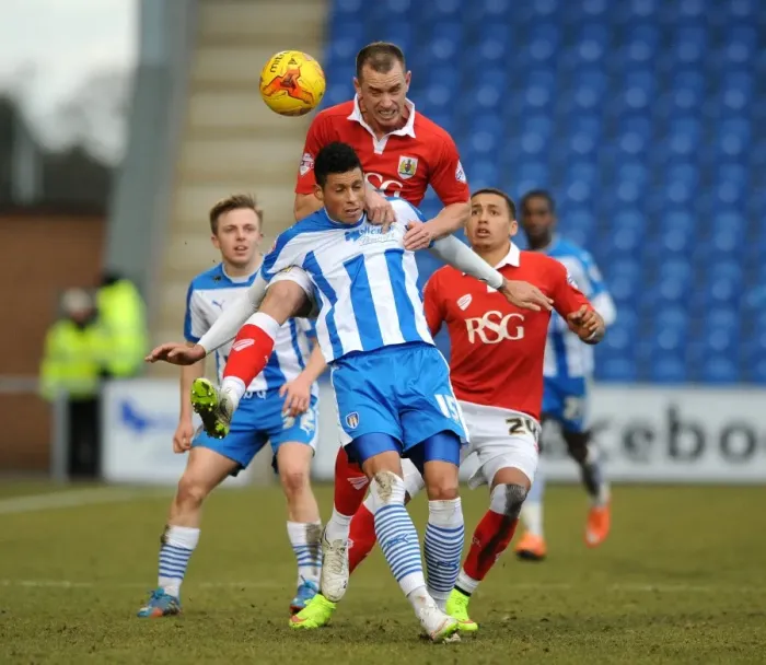 Framed Print : Bristol City vs Colchester United: Intense Aerial Battle Between Aaron Wilbraham and Matthew Briggs Framed Print : Bristol City vs Colchester United: Intense Aerial Battle Between Aaron Wilbraham and Matthew Briggs