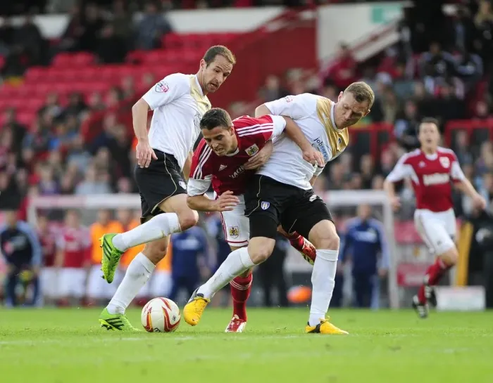 Framed Print : Bristol City vs Colchester United: McLaughlin Fouled by Wilson
