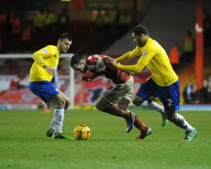 Framed Print : Bristol City vs Coventry City: Intense Battle for Possession between Cyrus Christie and Greg Cunningham Framed Print : Bristol City vs Coventry City: Intense Battle for Possession between Cyrus Christie and Greg Cunningham