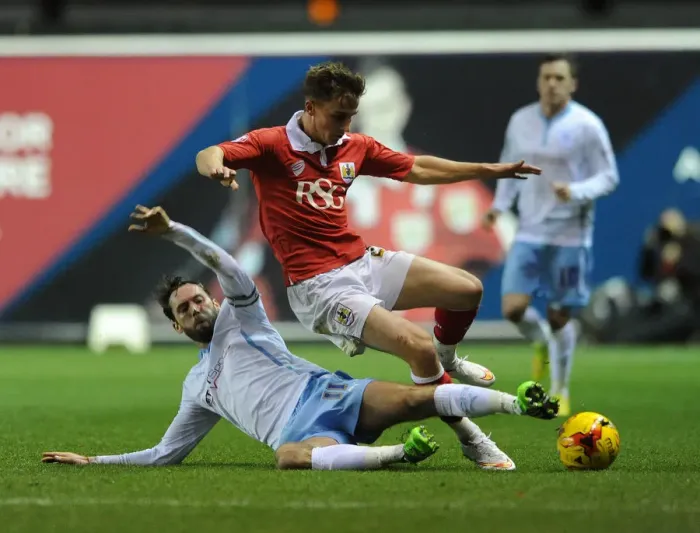Framed Print : Bristol City vs Coventry City: Joe Bryan Tackled by Jim O'Brien during Johnstones Paint Trophy Match