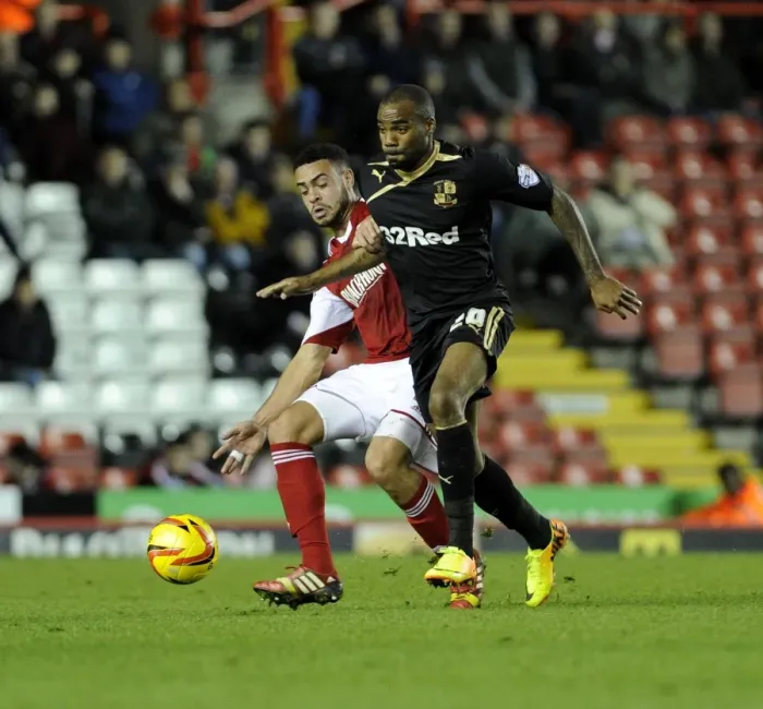Framed Print : Bristol City vs Crawley Town: Derrick Williams Tackles Emile Sinclair in Sky Bet League One Clash Framed Print : Bristol City vs Crawley Town: Derrick Williams Tackles Emile Sinclair in Sky Bet League One Clash