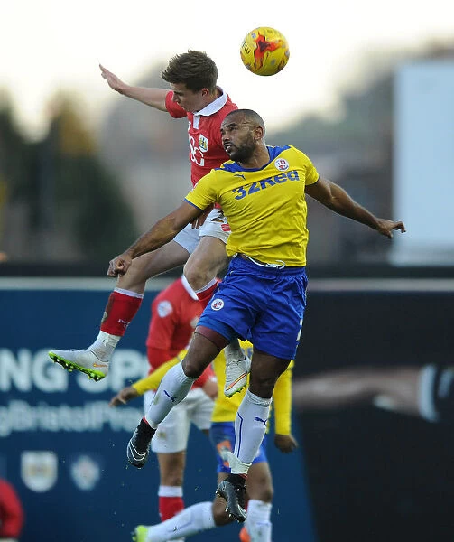 Bristol City vs Crawley Town: Intense Aerial Battle Between Joe Bryan and Lanre Oyebanjo