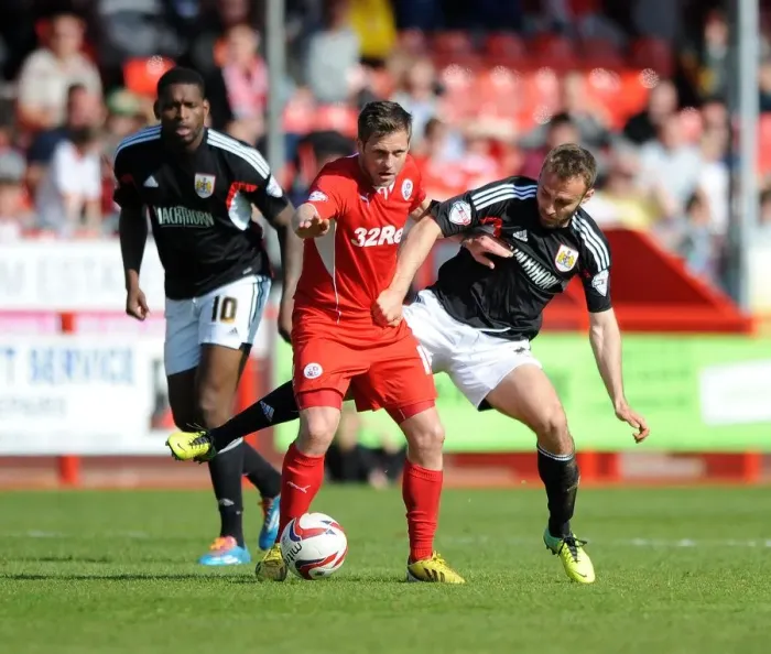 Framed Print : Bristol City vs Crawley Town: Intense Moment as Liam Kelly Faces Off Against Dannie Bulman