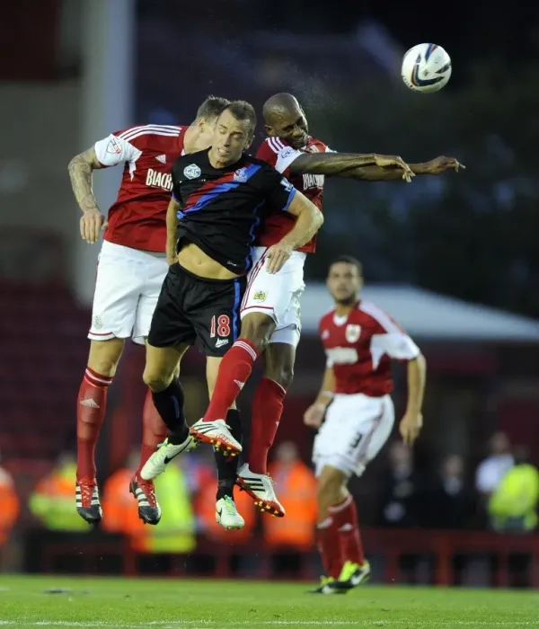 Framed Print : Bristol City vs Crystal Palace: Intense Aerial Battle Between Marvin Elliott and Aaron Wilbraham Framed Print : Bristol City vs Crystal Palace: Intense Aerial Battle Between Marvin Elliott and Aaron Wilbraham
