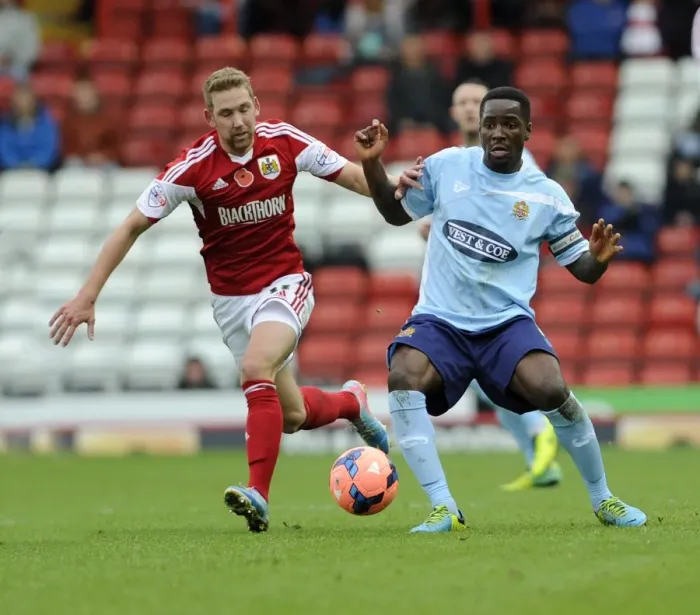 Framed Print : Bristol City vs Dagenham & Redbridge: A FA Cup First Round Showdown - Wagstaff vs Ogogo