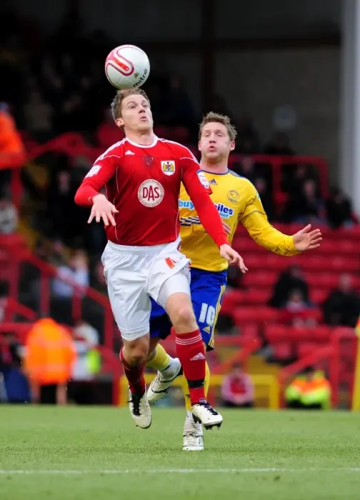 Framed Print : Bristol City vs Derby County: Christian Ribeiro vs Kris Commons Battle for Supremacy in the Championship (11-12-2010)