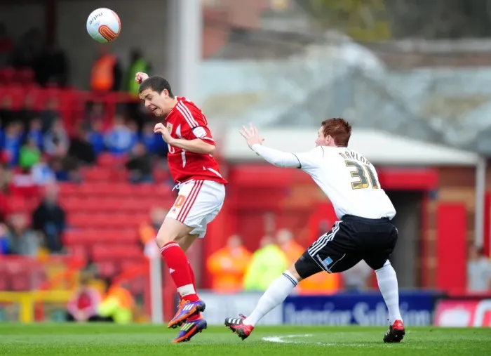 Framed Print : Bristol City vs Derby County: Aerial Battle between Hogan Ephraim and Tom Naylor at Ashton Gate Stadium, 2012 Framed Print : Bristol City vs Derby County: Aerial Battle between Hogan Ephraim and Tom Naylor at Ashton Gate Stadium, 2012