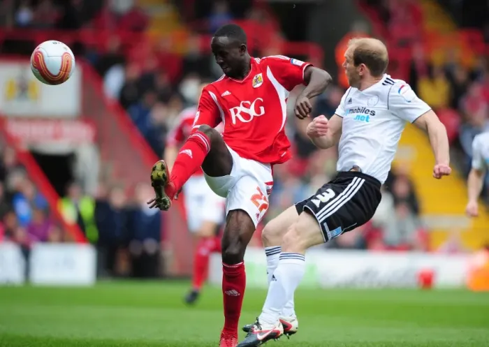 Framed Print : Bristol City vs Derby County: Albert Adomah vs Paul Green Battle for Possession at Ashton Gate Stadium, 2012 Framed Print : Bristol City vs Derby County: Albert Adomah vs Paul Green Battle for Possession at Ashton Gate Stadium, 2012
