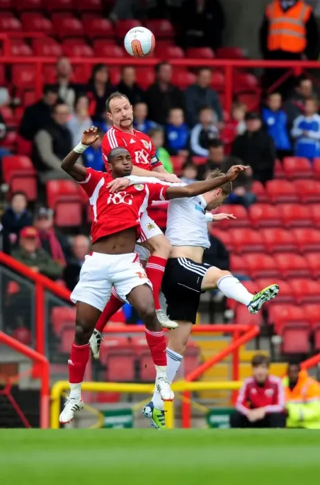 Framed Print : Bristol City vs Derby County: Intense Aerial Battle Between Louis Carey and Steve Davies Framed Print : Bristol City vs Derby County: Intense Aerial Battle Between Louis Carey and Steve Davies
