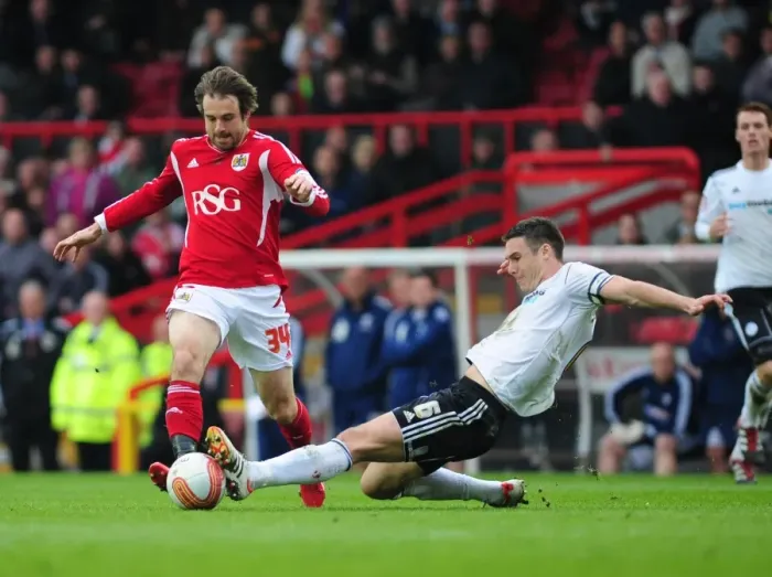 Framed Print : Bristol City vs Derby County: Intense Moment as Jason Shackell Tackles Brett Pitman