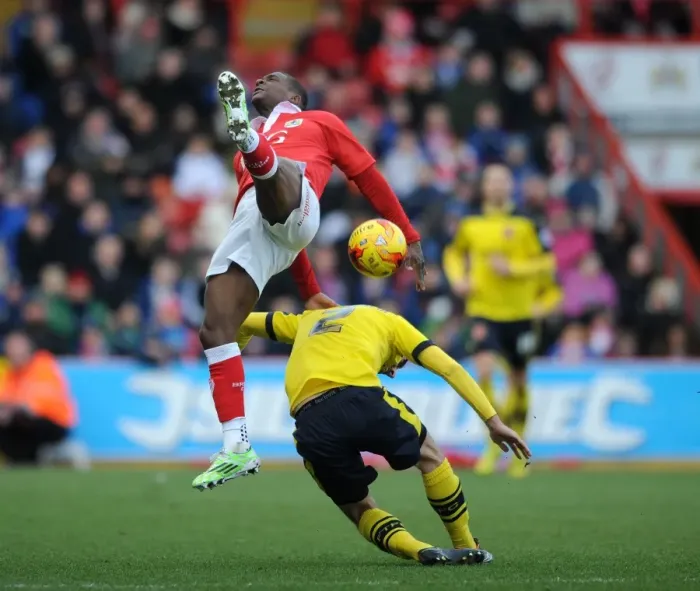 Framed Print : Bristol City vs Fleetwood Town: Intense Aerial Battle Between Kieran Agard and Conor McLaughlin