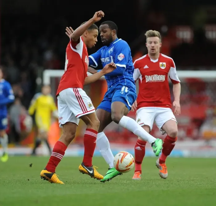 Framed Print : Bristol City vs Gillingham: Bobby Reid vs Myles Weston Clash in Sky Bet League One Framed Print : Bristol City vs Gillingham: Bobby Reid vs Myles Weston Clash in Sky Bet League One