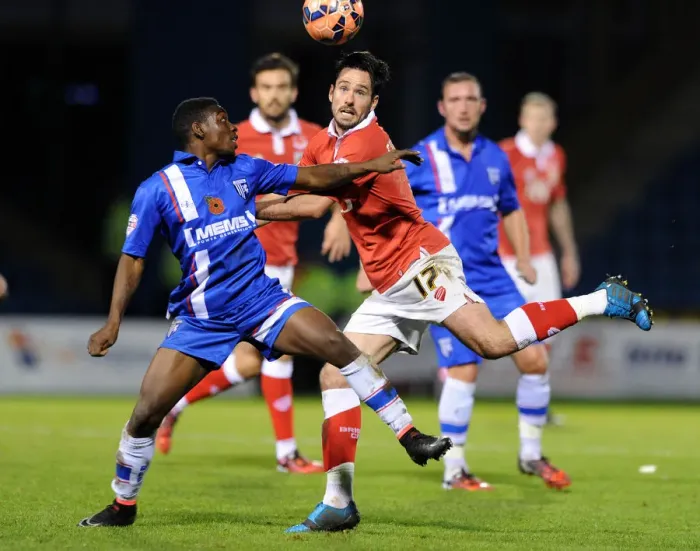 Framed Print : Bristol City vs Gillingham: Intense Aerial Battle Between Greg Cunningham and Jermaine McGlashan Framed Print : Bristol City vs Gillingham: Intense Aerial Battle Between Greg Cunningham and Jermaine McGlashan