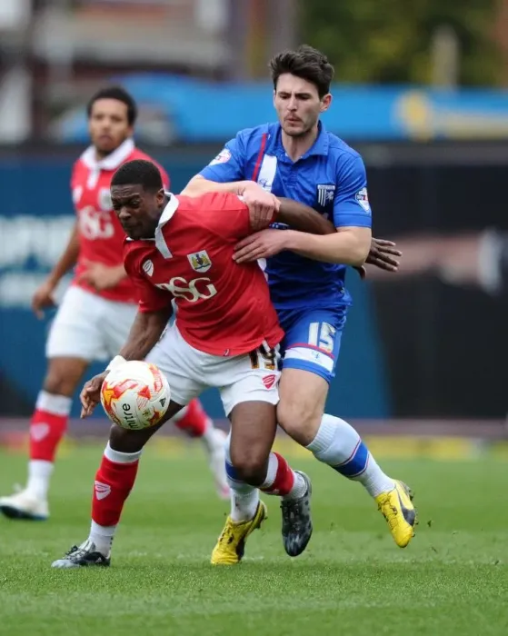 Framed Print : Bristol City vs Gillingham: Intense Battle Between Kieran Agard and Aaron Morris Framed Print : Bristol City vs Gillingham: Intense Battle Between Kieran Agard and Aaron Morris
