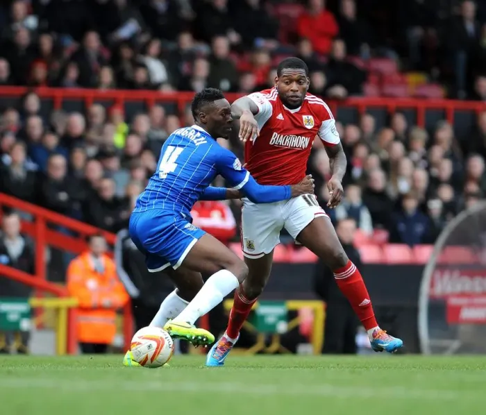 Framed Print : Bristol City vs Gillingham: Jay Emmanuel-Thomas vs Amine Linganzi Battle in Sky Bet League One Clash