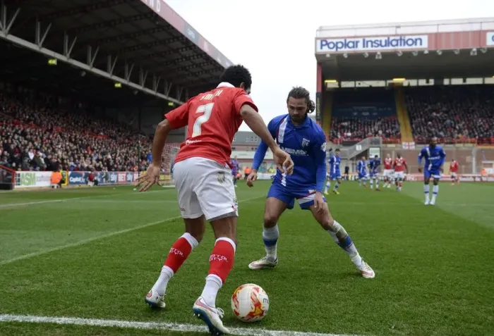 Framed Print : Bristol City vs Gillingham: Korey Smith Tries to Outmaneuver Bradley Dack Framed Print : Bristol City vs Gillingham: Korey Smith Tries to Outmaneuver Bradley Dack