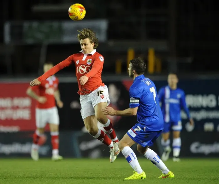 Framed Print : Bristol City vs Gillingham: Luke Freeman Outmuscles Doug Loft in Johnstone's Paint Trophy Clash Framed Print : Bristol City vs Gillingham: Luke Freeman Outmuscles Doug Loft in Johnstone's Paint Trophy Clash