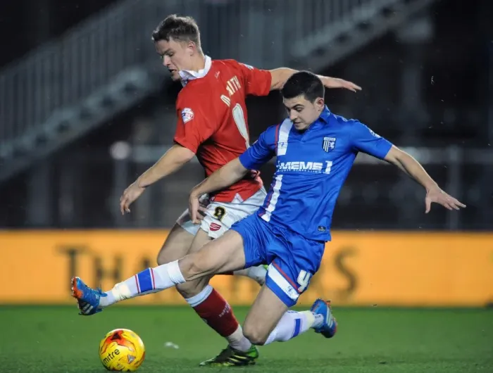 Framed Print : Bristol City vs Gillingham: Matt Smith Tackled by John Egan during Johnstone's Paint Trophy Match Framed Print : Bristol City vs Gillingham: Matt Smith Tackled by John Egan during Johnstone's Paint Trophy Match