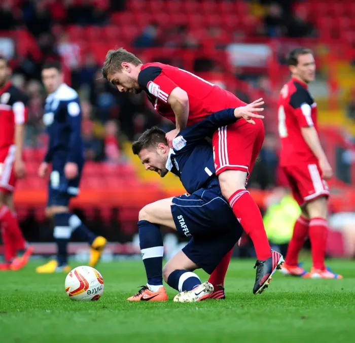 Framed Print : Bristol City vs Huddersfield: Davies Fouls Norwood - Football Action