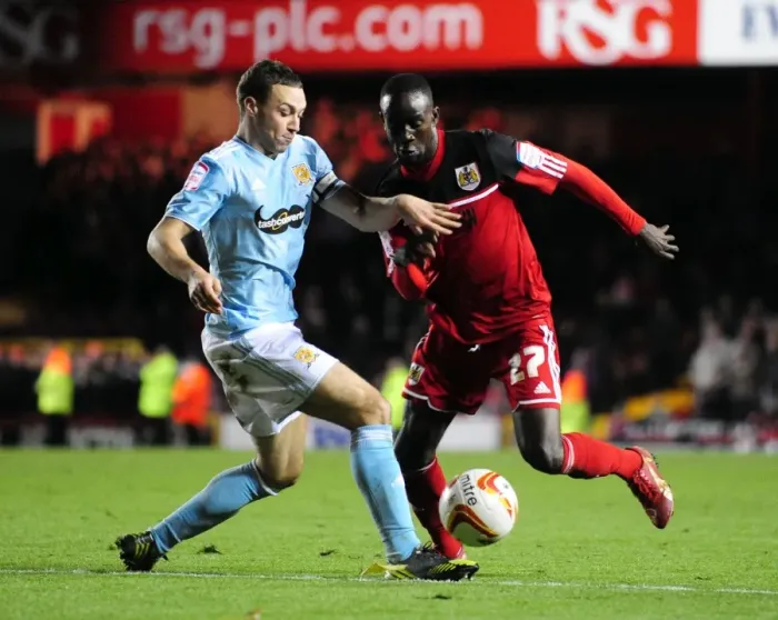 Framed Print : Bristol City vs. Hull City: Albert Adomah vs. James Chester Battle in Championship Match Framed Print : Bristol City vs. Hull City: Albert Adomah vs. James Chester Battle in Championship Match