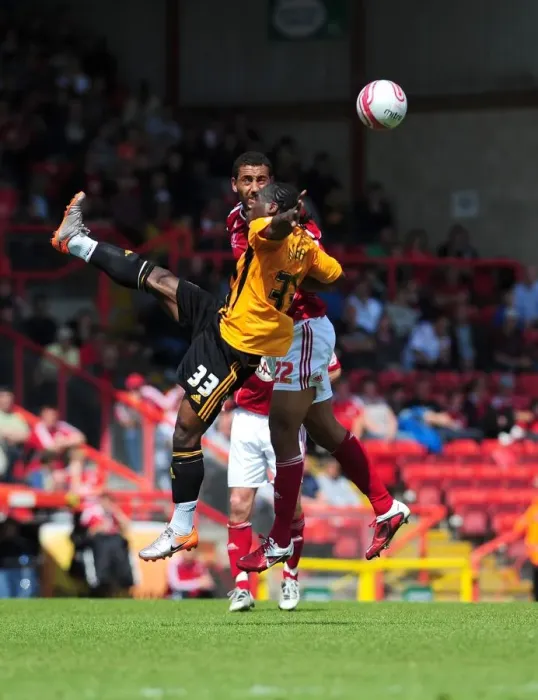 Framed Print : Bristol City vs Hull City: Intense Aerial Battle Between Lowein Nyatanga and Aaron Mclean, Championship Match, May 2011