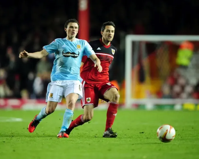 Framed Print : Bristol City vs Hull City: Intense Battle Between Cole Skuse and Corry Evans