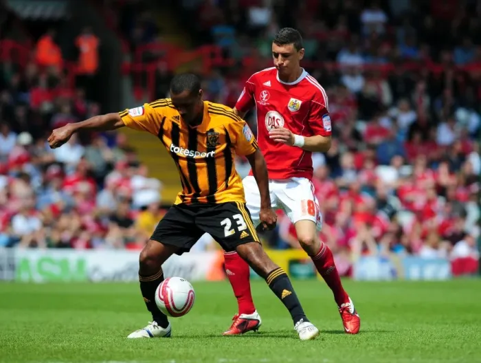 Framed Print : Bristol City vs Hull City: Intense Battle for Possession - Championship Football Match, May 2011 (James Wilson vs Jay Simpson)