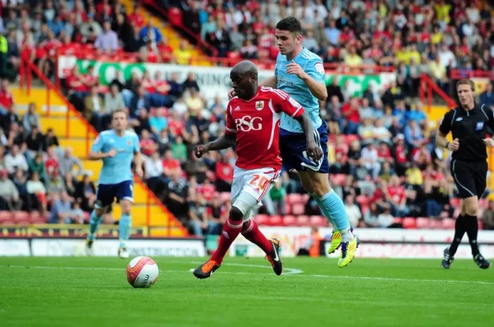 Framed Print : Bristol City vs Hull City: Jamal Campbell-Ryce vs Robert Brady Battle in Championship Match, September 2011