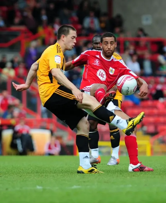 Framed Print : Bristol City vs Hull City: Lewin Nyatanga's Battle for the Ball - Championship Match, May 2011 Framed Print : Bristol City vs Hull City: Lewin Nyatanga's Battle for the Ball - Championship Match, May 2011