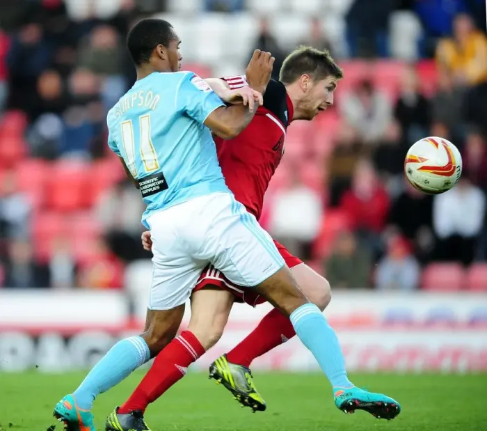 Framed Print : Bristol City vs Hull City: Mark Wilson vs Jay Simpson Battle for Ball in Championship Match, October 2012 Framed Print : Bristol City vs Hull City: Mark Wilson vs Jay Simpson Battle for Ball in Championship Match, October 2012