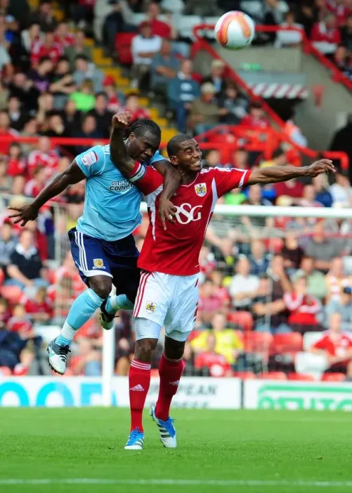 Framed Print : Bristol City vs Hull City: Marvin Elliott vs Aaron Mclean Battle in Championship Match, September 2011 Framed Print : Bristol City vs Hull City: Marvin Elliott vs Aaron Mclean Battle in Championship Match, September 2011