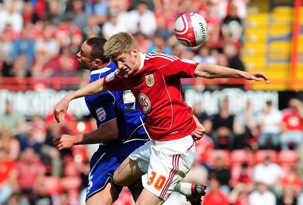 Bristol City vs Ipswich Town: Aerial Battle between Jon Stead and Damien Delaney, Championship Match, April 2011