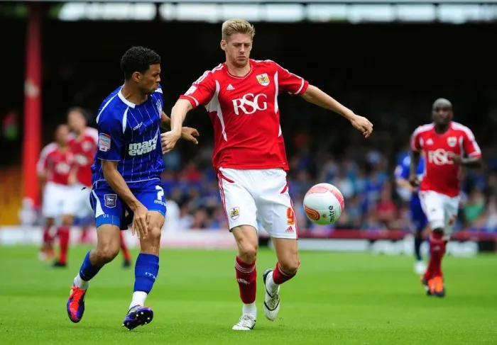 Framed Print : Bristol City vs Ipswich Town: Jon Stead vs Carlos Edwards Battle for Ball in Championship Match, August 2011 (Ashton Gate Stadium) Framed Print : Bristol City vs Ipswich Town: Jon Stead vs Carlos Edwards Battle for Ball in Championship Match, August 2011 (Ashton Gate Stadium)