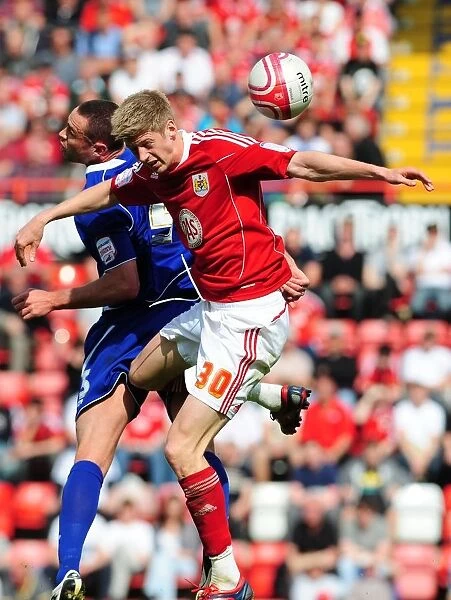 Bristol City vs Ipswich Town: Jon Stead vs Damien Delaney's Aerial Battle in Championship Football, April 2011