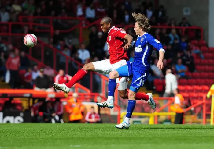 Framed Print : Bristol City vs Ipswich Town: Marvin Elliott vs Jimmy Bullard Battle for Ball in Championship Match, April 2011 Framed Print : Bristol City vs Ipswich Town: Marvin Elliott vs Jimmy Bullard Battle for Ball in Championship Match, April 2011
