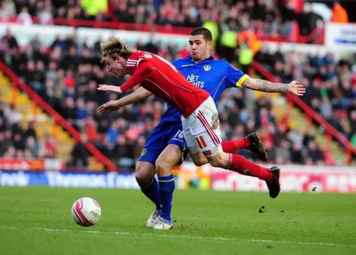 Framed Print : Bristol City vs Leeds United: Martyn Woolford Foul by Bradley Johnson - Championship Clash at Ashton Gate Stadium (February 12, 2011) Framed Print : Bristol City vs Leeds United: Martyn Woolford Foul by Bradley Johnson - Championship Clash at Ashton Gate Stadium (February 12, 2011)