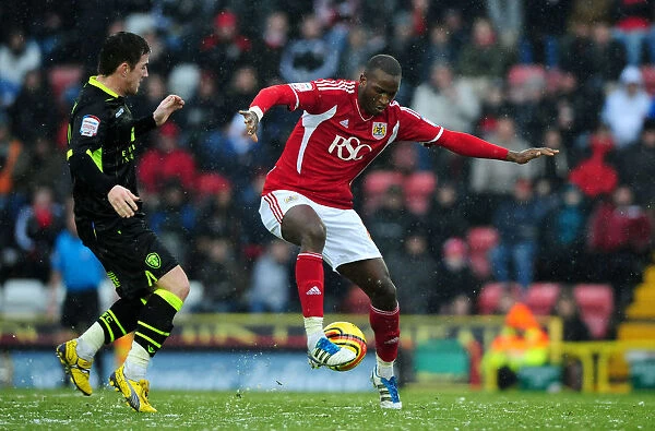 Bristol City vs Leeds United: Intense Battle Between Kalifa Cisse and Ross McCormack in Championship Match, 2011