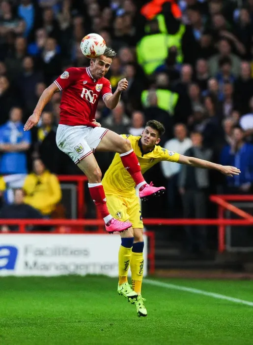Framed Print : Bristol City vs Leeds United: Joe Bryan's Headed Clash with Sam Byram Framed Print : Bristol City vs Leeds United: Joe Bryan's Headed Clash with Sam Byram