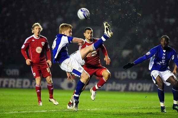 Bristol City vs Leicester City: Ben Mee Clears Ball in Championship Clash - 18 / 02 / 2011