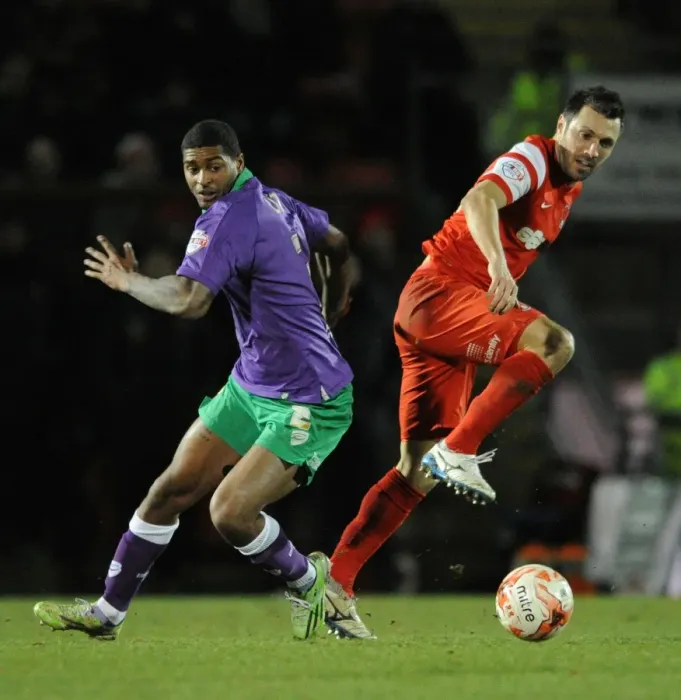 Framed Print : Bristol City vs Leyton Orient: Mark Little and Andrea Dossena Clash in Sky Bet League One Match, 2015