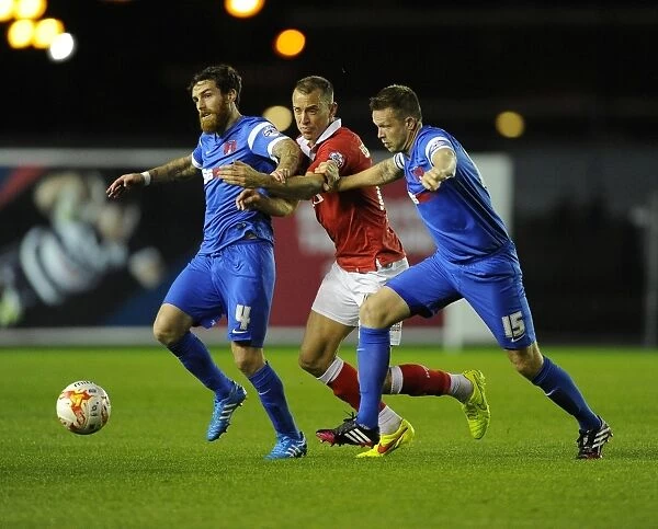 Bristol City vs Leyton Orient: Sam Baldock Fights for Possession