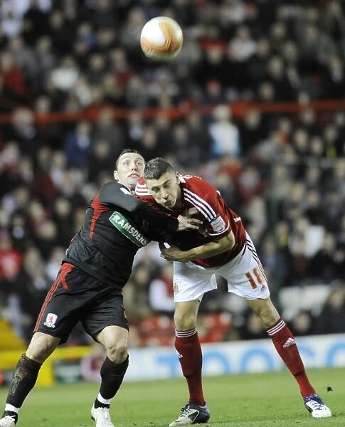 Bristol City vs. Middlesbrough: Aerial Clash Between James Wilson and Scott McDonald